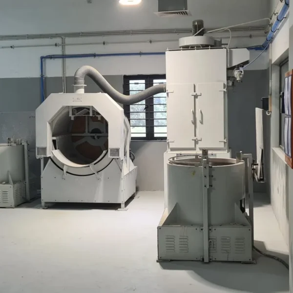 Ceramic slurry mixing and shell coating equipment in an investment casting shell room